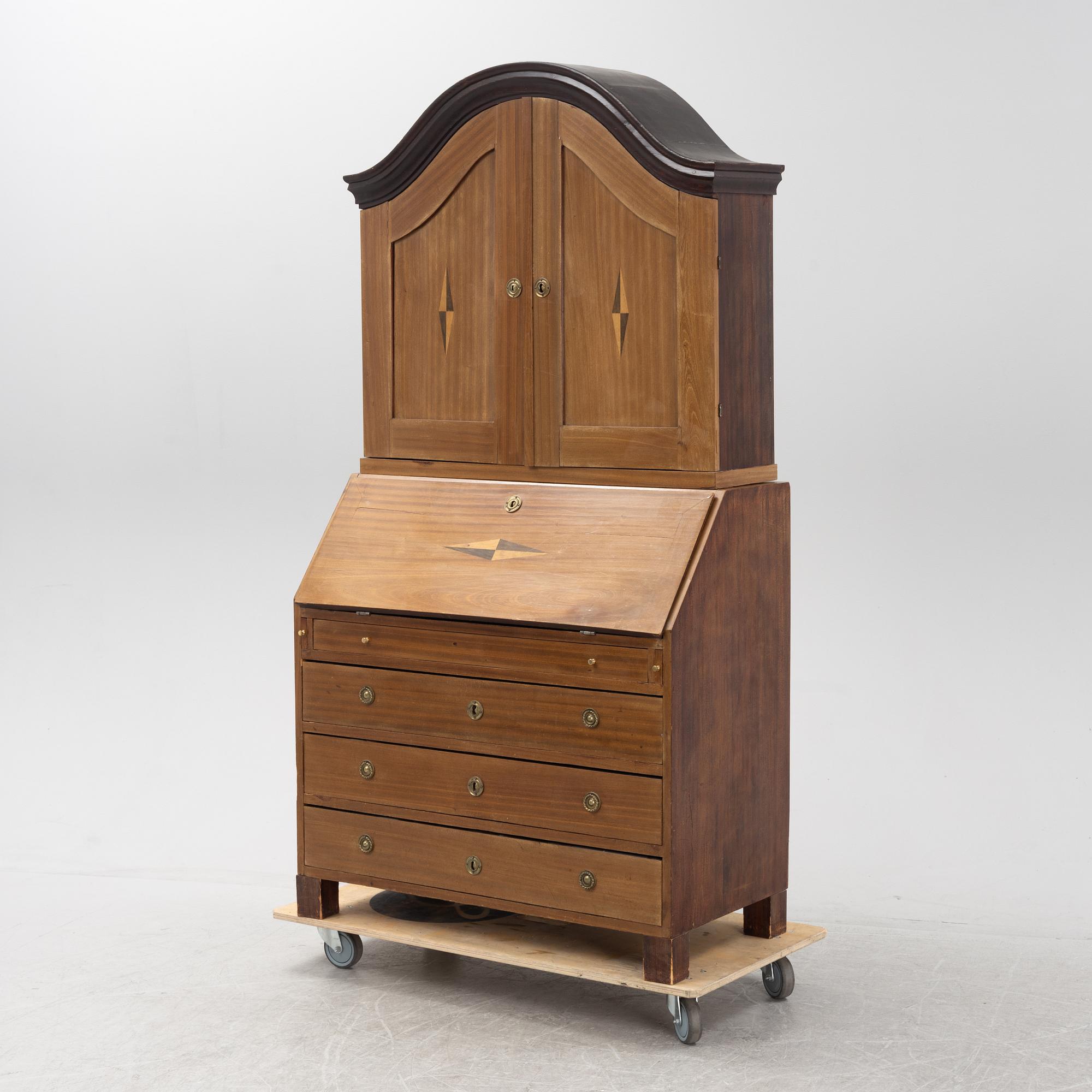 A mahogany-veneered Empire cabinet, first part of the 19th Century.