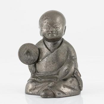 A pewter figurine, China, late Qign Dynasty, around 1900.