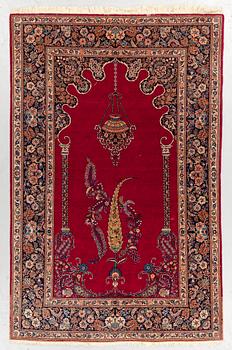 A RUG, semi-antique Kashan, around 210 x 136 cm.