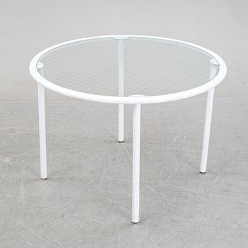 Giandomenico Belotti, attributed to, a griddled glass and metal dining table, by Fly Line, Italy, 1970s.