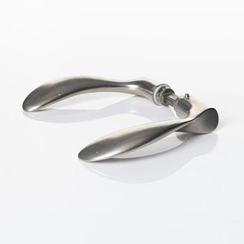 Arne Jacobsen, a door handle 'AJ-Grebet' for SAS Royal Hotel, Copenhagen 1956, executed by Carl F Petersen.
