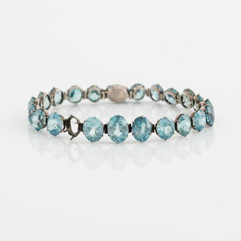 Silver and blue zircon bracelet.