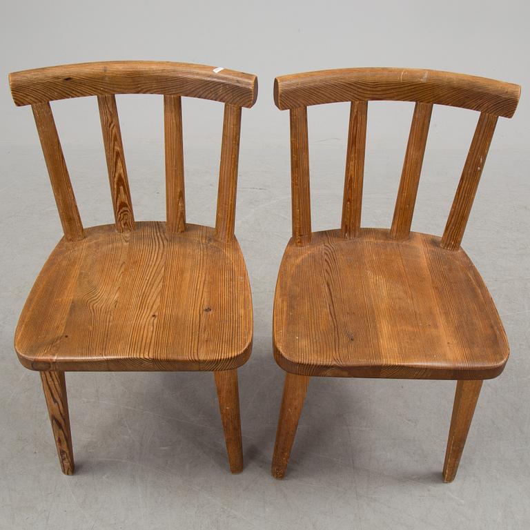 A pair of "Utö" pinewood chairs by Axel Einar Hjorth in the 1930's.