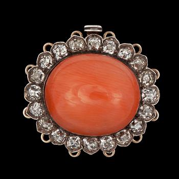 1015. A coral and diamond clasp. Total carat weight of diamonds circa 1.20 cts. Made for a 6-strand pearl necklace.