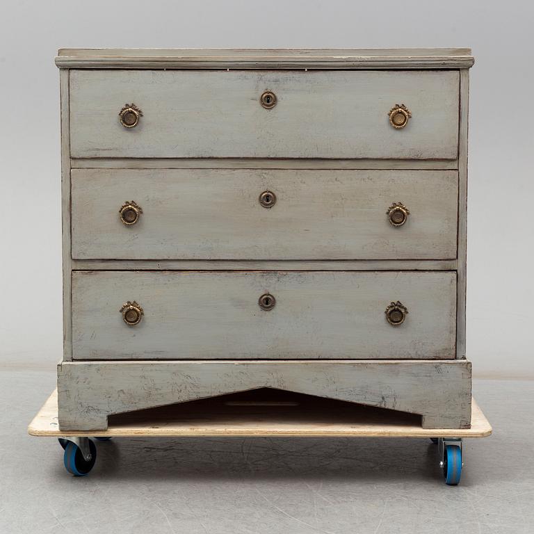 A mid 19th century painted chest of drawers.