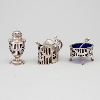 A mustard pot, a pepper pot, a salt cellar, silver, London, England, early 20th century. Weigth ca 412 grams.