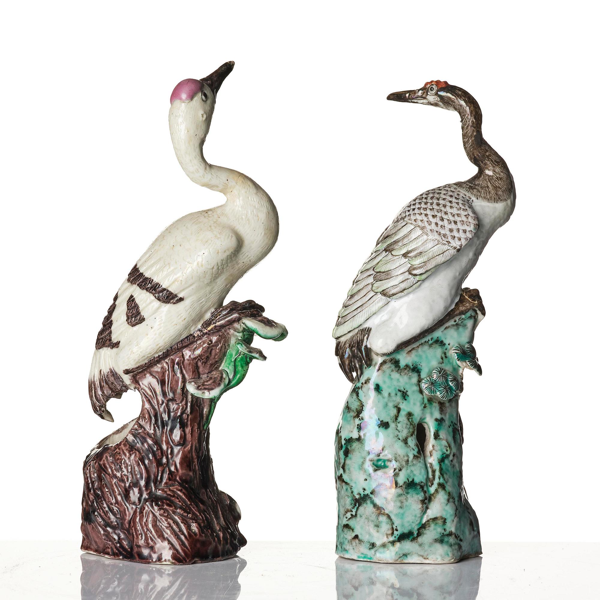 A pair of Chinese figures of birds, Qing dynasty, 19th century.