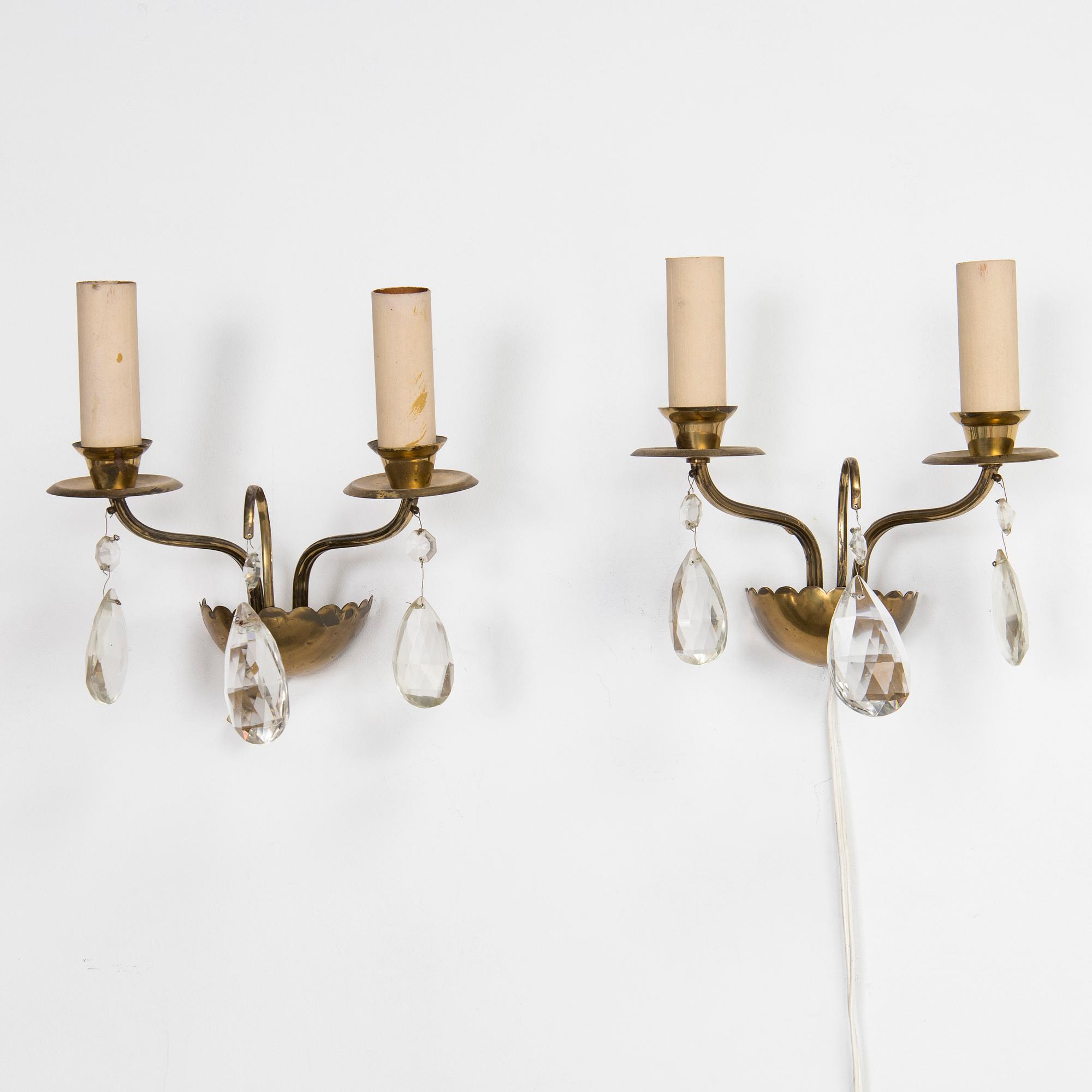 Four of mid-20th century wall sconces.