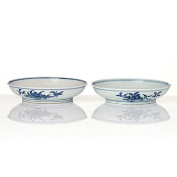 A pair of blue and white nine peaches dishes, China, presumably Republic, with Yongzheng mark.