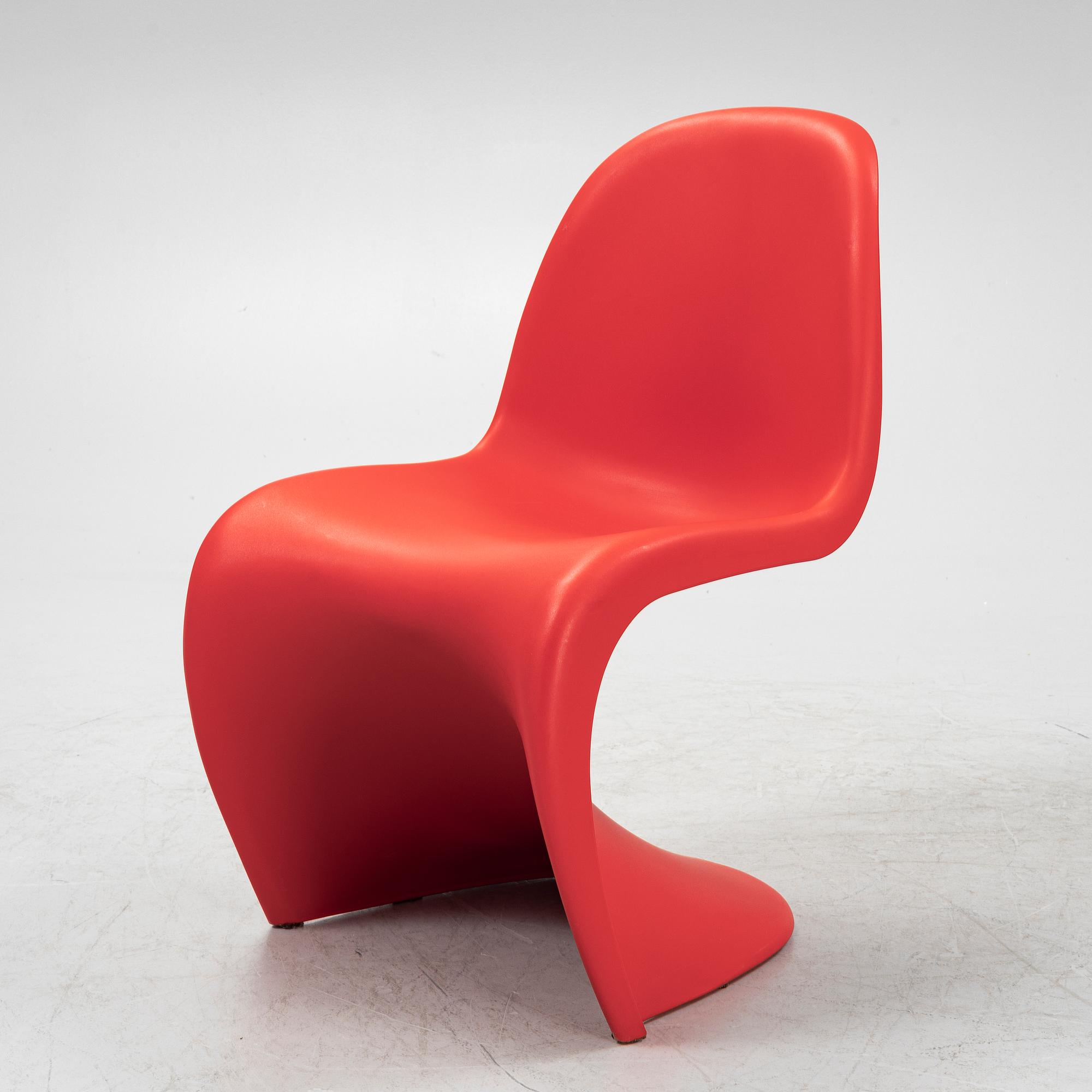 Verner Panton, four red plastic 'Panton Chair Classic', chairs, Vitra, 2010.