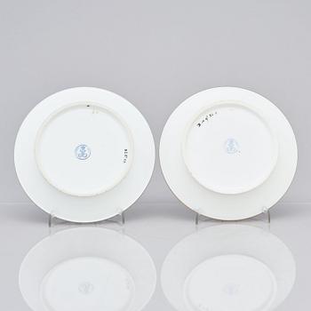 A pair of Sèvres cups with stands, 19th Century.