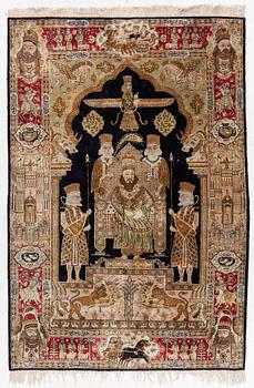 A pictorial semi-antique silk Qum rug, central Persia, c. 214 x 146 cm.