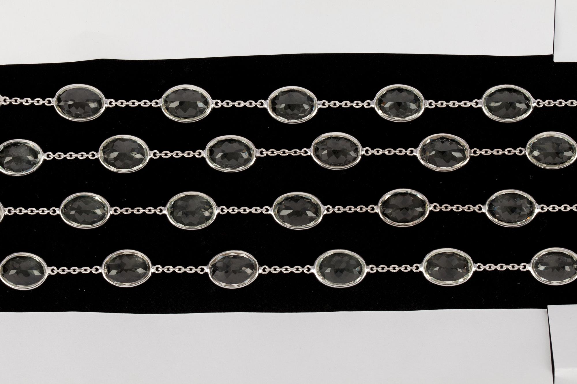 A long green quartz necklace.