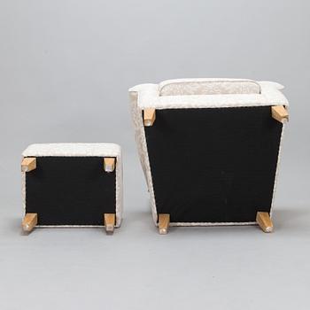 A mid-20th-century armchair and ottoman.
