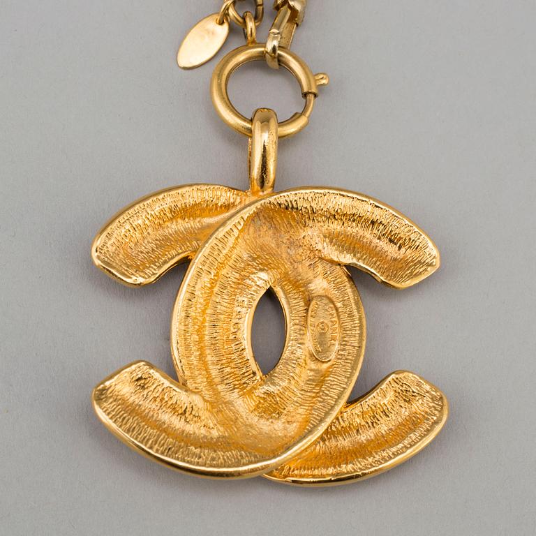 CHANEL, a metal necklace/belt.