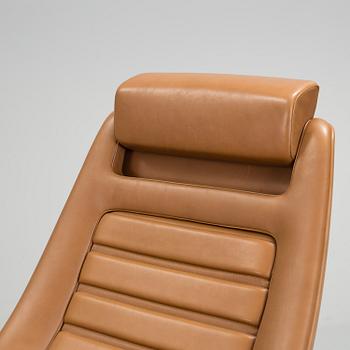 A "Manzù Lounge Chair" by Pio Manzu for Alias.