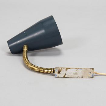 Lisa Johansson-Pape, a 1960's model '50-056' wall light for Stockmann Orno.