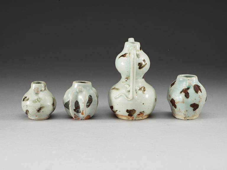 A 'spotted' ewer and three jars, Yuan dynasty (1271-1368).