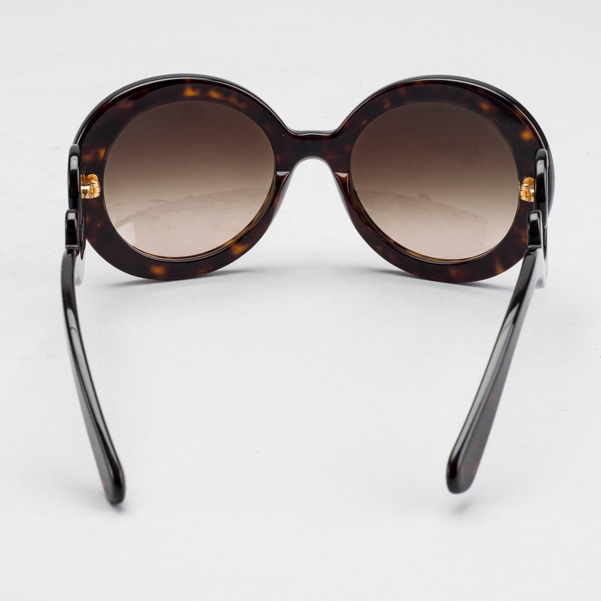 PRADA, sunglasses.