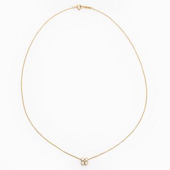 Tiffany & Co, an 18K gold necklace with diamonds.