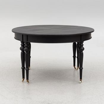 A dining table, late 19th Century.