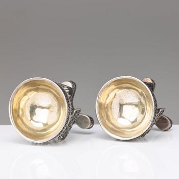 A pair of 19th century parcel-gilt silver salt-cellars, unidentified marks.