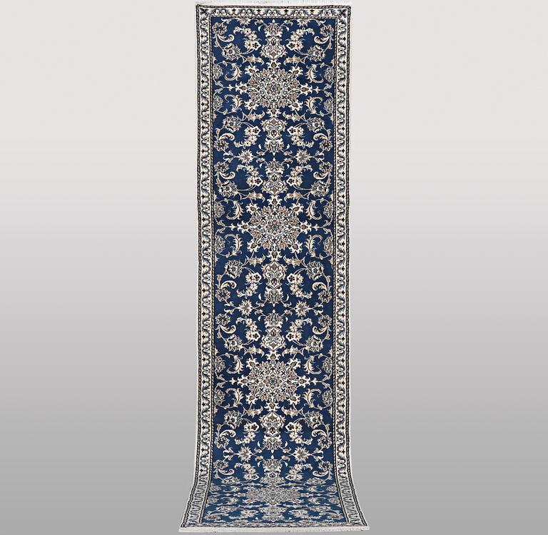 A runner carpet, Nain, part silk, ca 374 x 75 cm.
