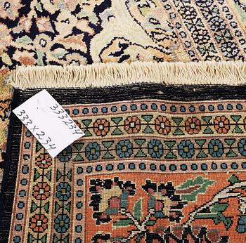 A Kashmir carpet, silk, c. 333 x 234 cm.