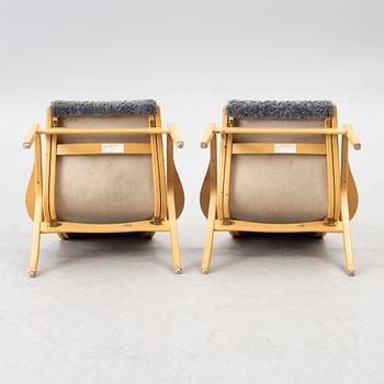 Yngve Ekström, a pair of 'Lamino' easy chairs, Swedese 2004.
