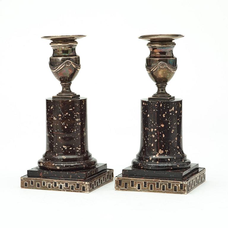 A pair of porphyry and silver candlesticks by Anders Christian Levon, Åbo 1799.