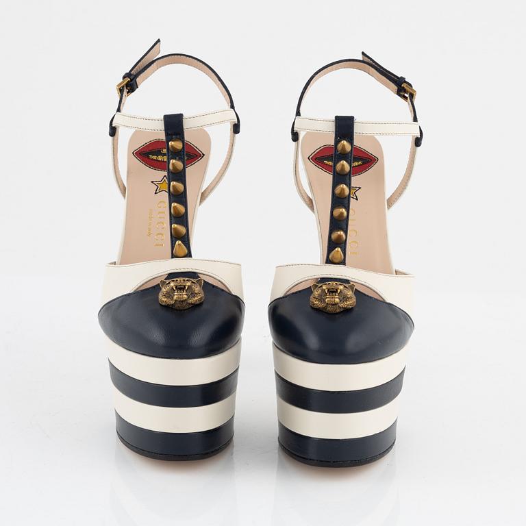 Gucci, a pair of navy and white leather high heel shoes, 2016, size 37.