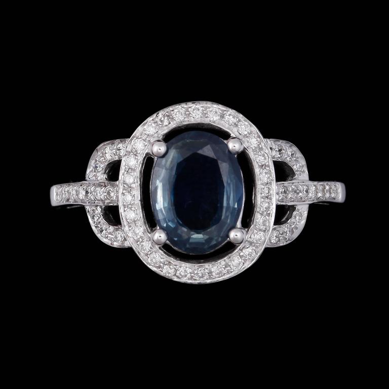 RING, vitguld 14K, med safir ca 1.6 ct och diamanter. Tot ca 3 gram.
