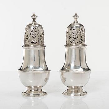 A pair of Britannia standard silver sugar-casters, marks of Samuel Welder, London, 1723.