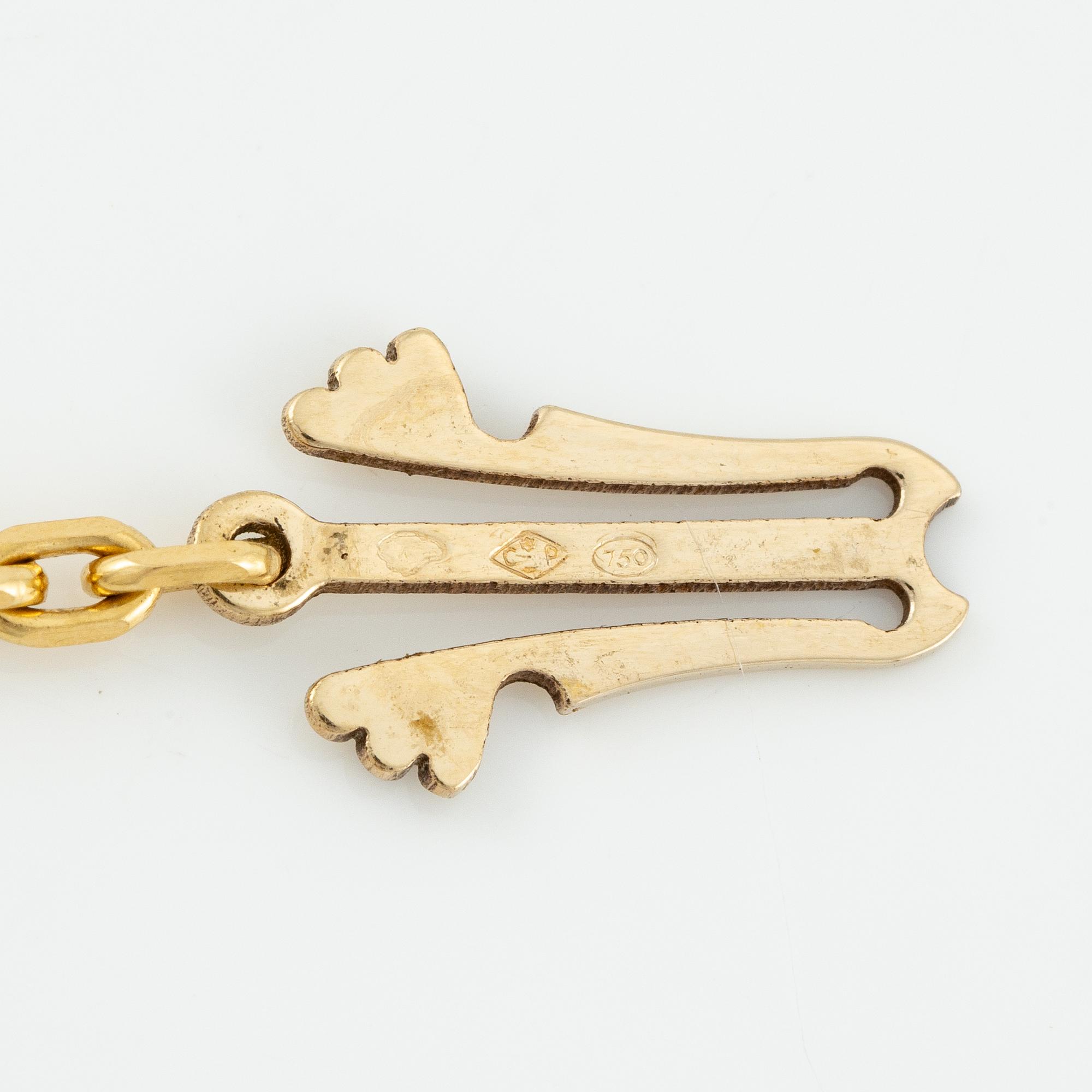 A Van Cleef & Arpels "Alhambra" necklace 18K gold with mother-of-pearl and onyx.