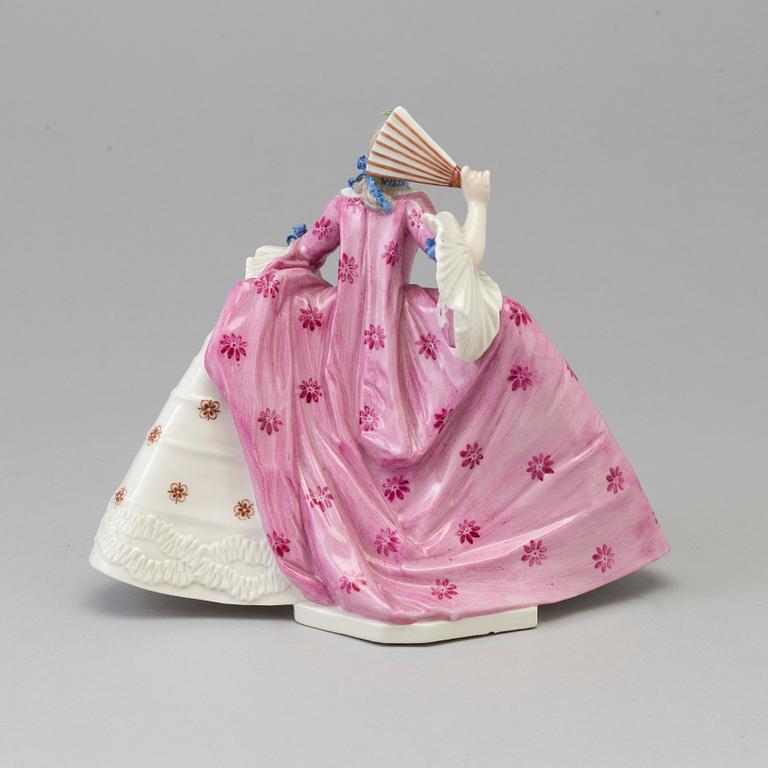 A Nymphenburg porcelain figure of a lady, Germany, 20th Century.