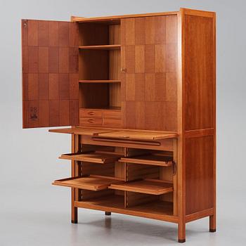 David Rosén, a mahogany and teak cabinet, for Stockholm's Association of Crafts, signed and dated 1959.