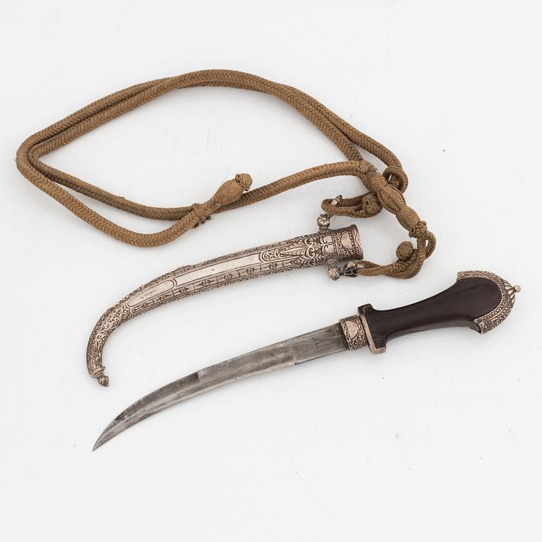 A powderhorn and Jambyia, north Africa, 19th/ 20th Century.