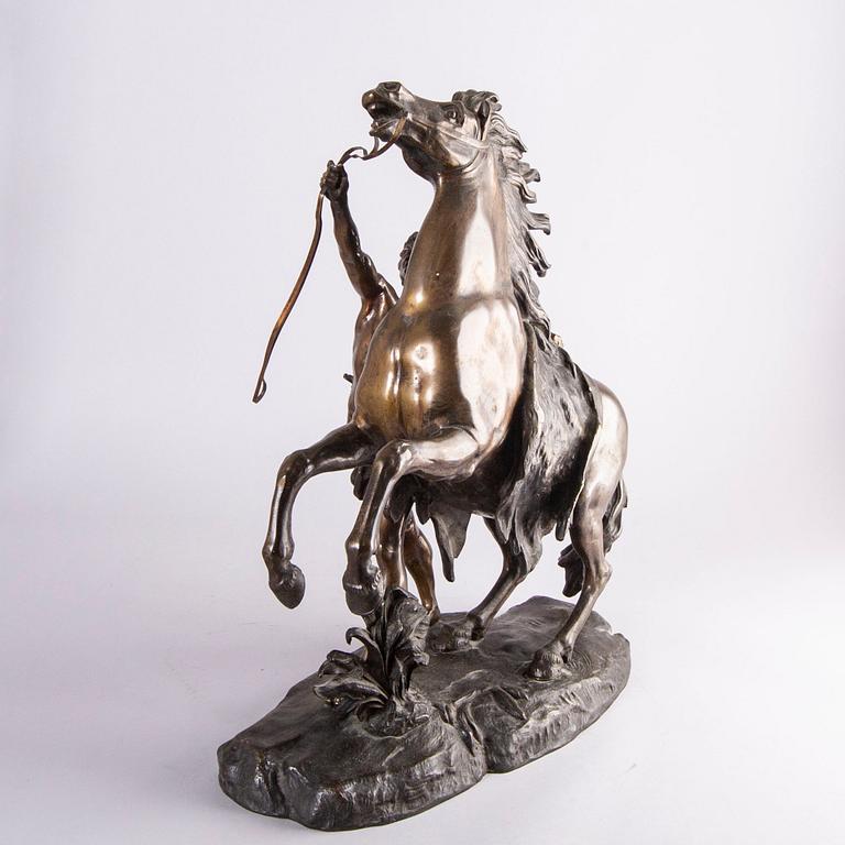 Guilliaume Coustou, after, a signed bronze sculpture  "Chevaux de Marly" from the second part of the 1800's.