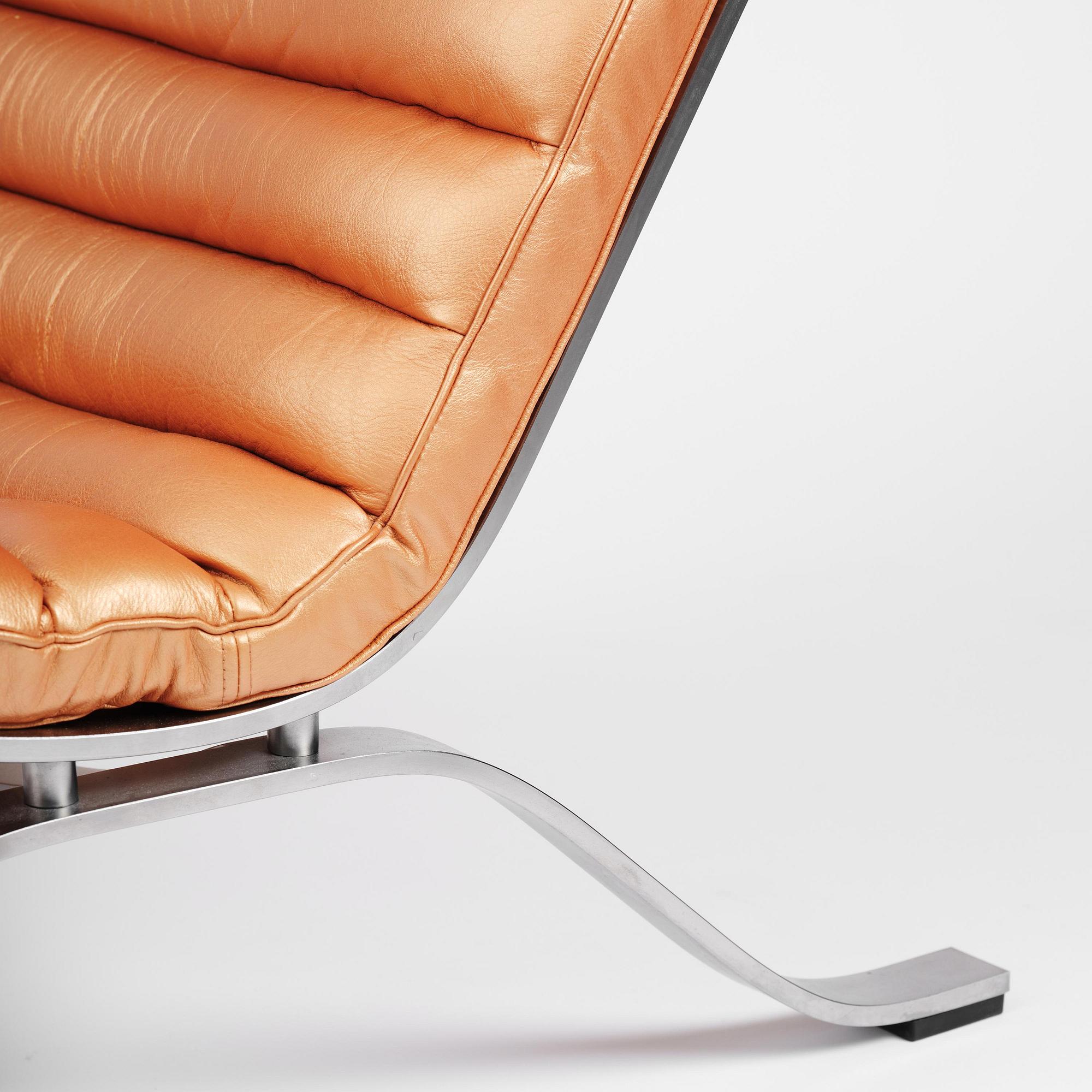 Arne Norell, an "Ari" easy chair with ottoman, Norell Möbel, Aneby, ca 2020.