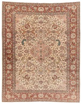 A semiantique Dragon Tabriz 'Ghanadi' carpet, c 342 x 263 cm.