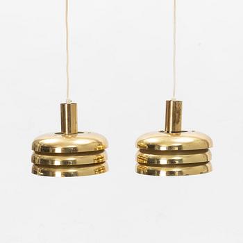 Hans-Agne Jakobsson, a pair of brass model 'T 724/M' ceiling lights, Markaryd.