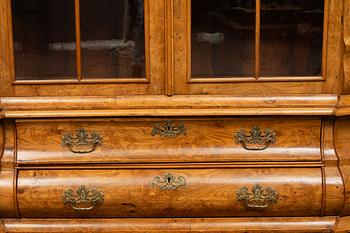 A Rococo style display cabinet, the Netherlands, circa 1900.