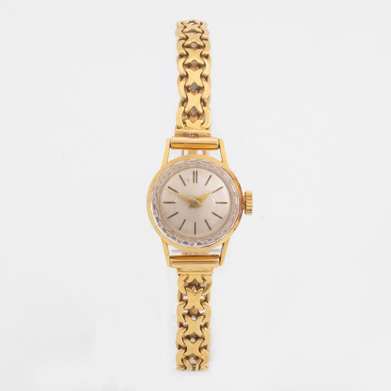 18K gold ladies watch.