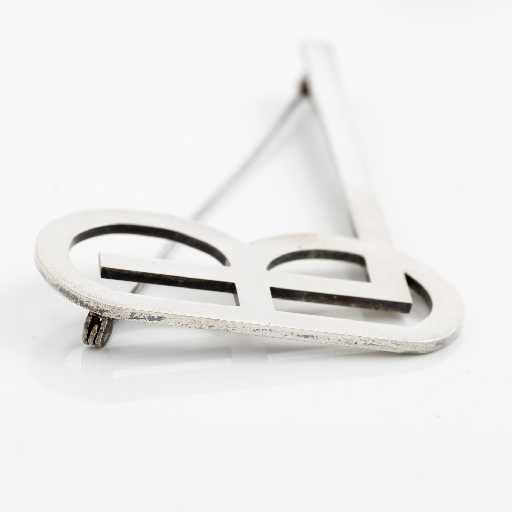 Wiwen Nilsson, a monogram brooch, sterling silver, Lund 1943.