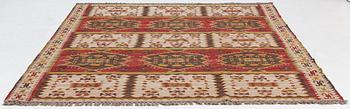 A Kilim carpet, c. 305 x 250 cm.