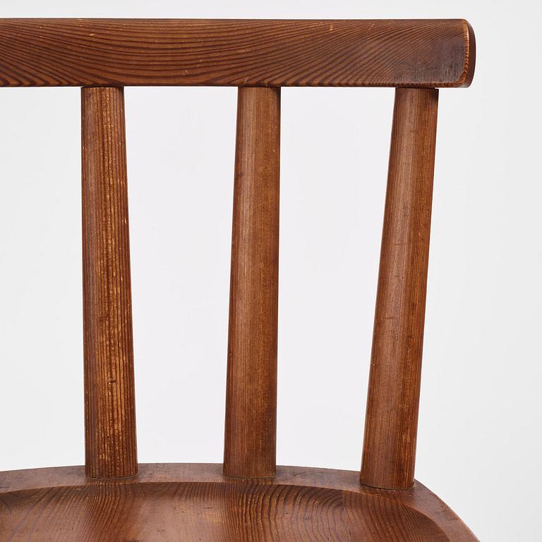 Axel Einar Hjorth, a set of six stained pine "Utö" chairs, Nordiska Kompaniet, Sweden, 1930s.