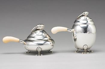 Georg Jensen, a four pieces of "Blossom" tea- and coffee set, Copenhagen 1918-1919, 830/1000 silver, design nr 2 and 100.