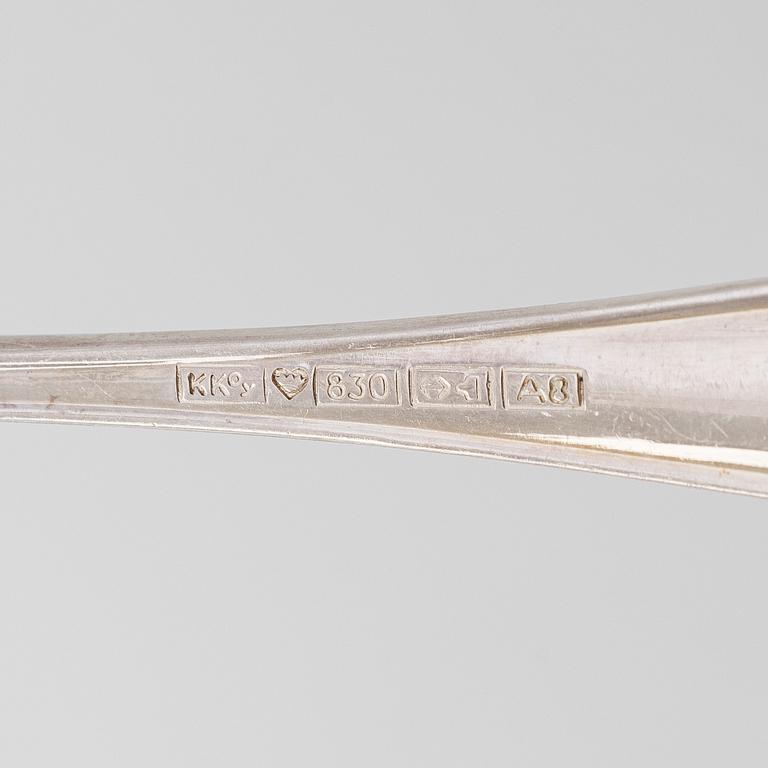 An 56-piece set of 'Chippendale' silver cutlery, Finnish hallmarks.