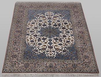 A rug, Esfahan, part silk, ca 245 x 155 cm.