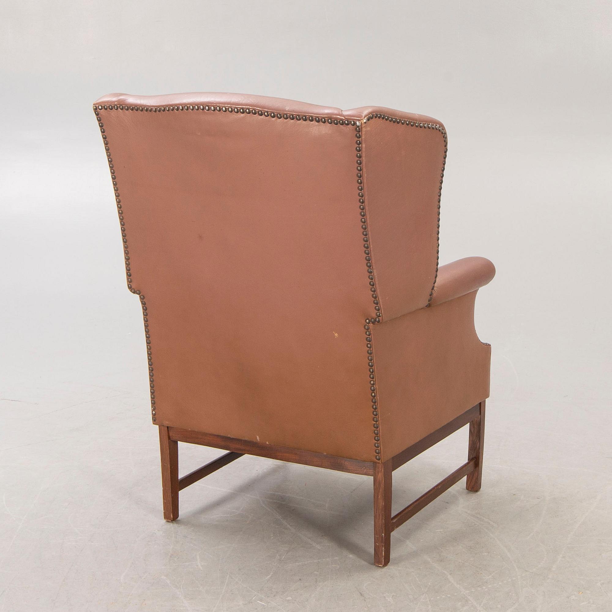A 1960s leather armchair.